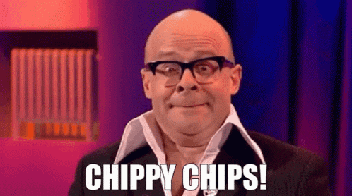 a bald man wearing glasses and a suit is talking about chips .