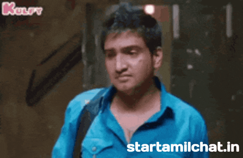 a man in a blue shirt with the words starttamilchat.in on the bottom right