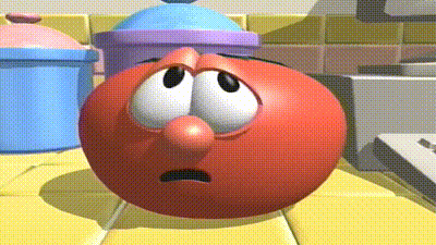 a cartoon tomato with a sad face is sitting on a table