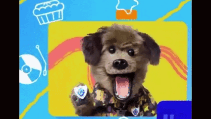 a stuffed animal dog wearing a police uniform is standing in front of a yellow background .