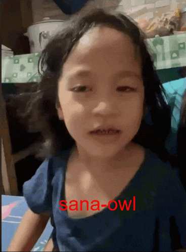 a little girl with sana-owl written in red on the bottom