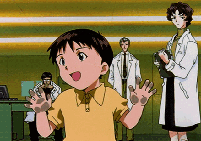 a boy in a yellow shirt stands in front of a group of scientists