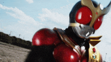 a close up of a masked superhero with the letter n on his chest