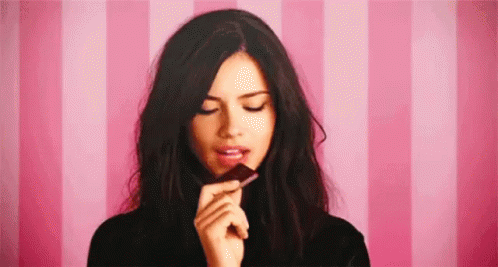 Adriana Lima Eating Chocolate GIF - Chocolate Adriana Lima Victorias Secret GIFs