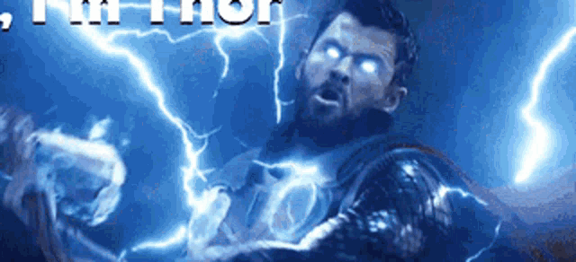 a man with a beard is surrounded by lightning and the word thor is above him .