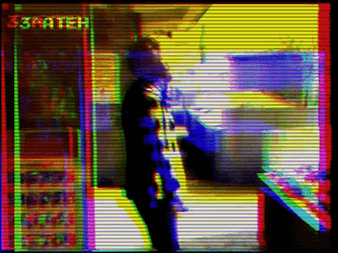 a blurred image of a person standing in front of a sign that says 33aaeh