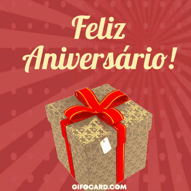 a gift box with a red ribbon and the words " feliz aniversario " above it