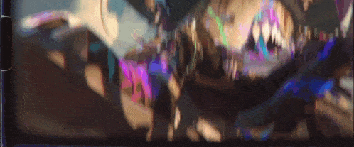 a blurry picture of a person 's face with a purple and blue background