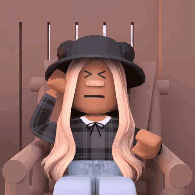 a girl with a bandage on her face is sitting on a rocking chair
