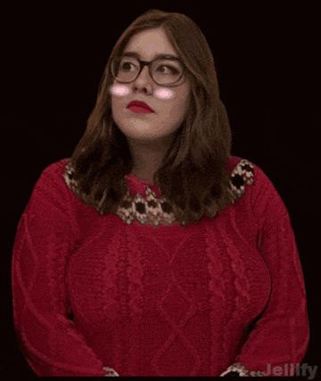 a woman wearing glasses and a red sweater has jellyfy written on the bottom right