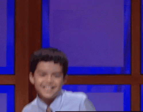 a blurry picture of a man in a white shirt and tie