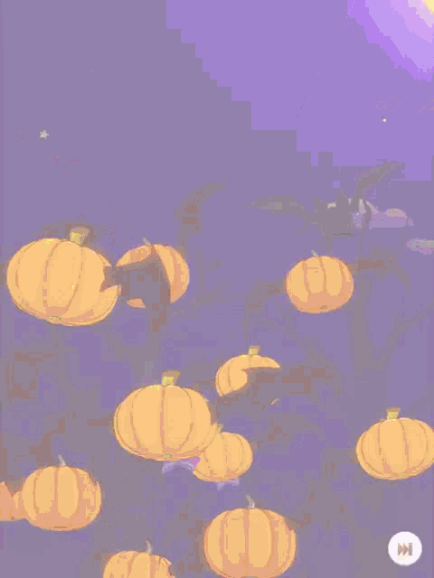 a bunch of pumpkins and bats are flying in the night sky