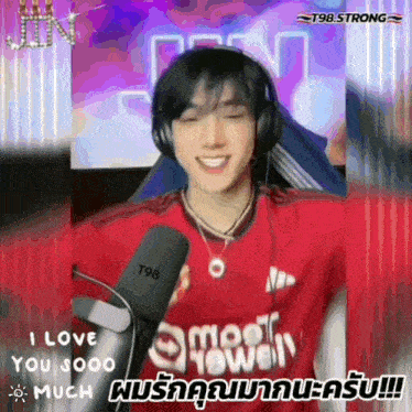 a young man wearing headphones and a red shirt says i love you sooo much