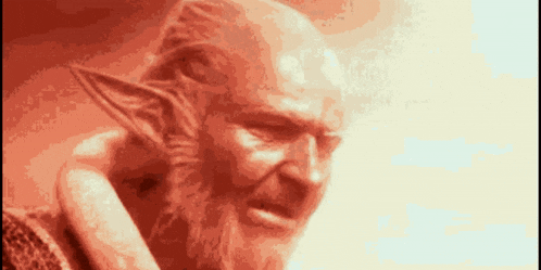 a statue of a man with a beard and ears