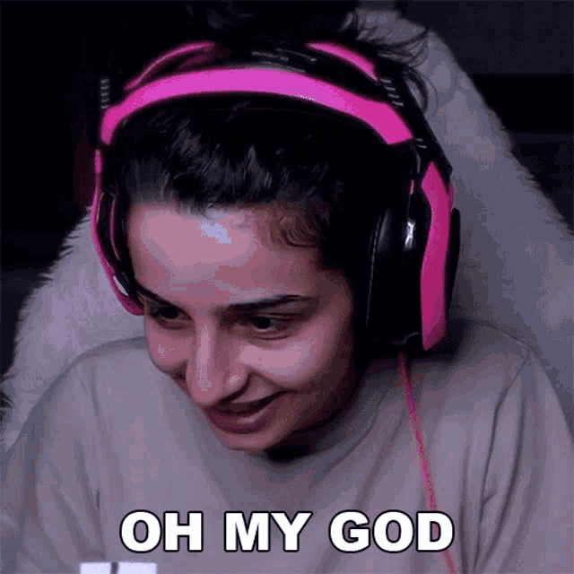 a woman wearing headphones with the words oh my god written on her face