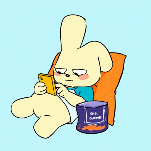 a cartoon rabbit is laying on a pillow looking at a cell phone next to a can of smol carrose