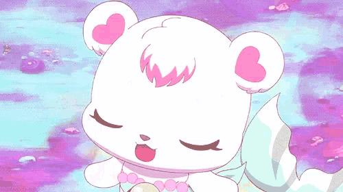 a white teddy bear with pink hearts on its ears is sitting on a purple background .