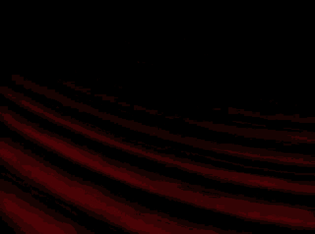 a red background with yellow lines and a star in the corner