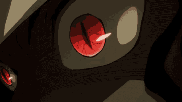 a close up of a person 's red eye with a light coming out of it