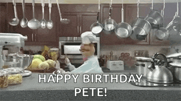 a chef is standing in a kitchen with pots and pans hanging from the ceiling and saying `` happy birthday pete ! ''
