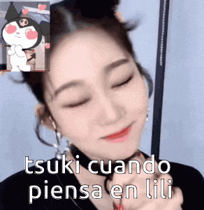 a close up of a woman 's face with the words tsuki cuando piensa en lili written above her .