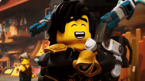 a lego character is smiling and holding a piece of paper