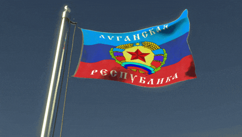 a blue red and yellow flag with a red star and the words avtancka