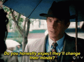 a man holding an umbrella says do you honestly expect they 'll change their minds ?