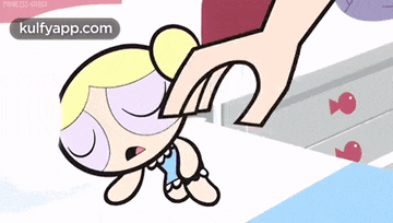 bubbles from the powerpuff girls is being held by a person 's hand