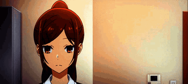 a close up of a girl 's face with tears coming out of her eyes and a ponytail .