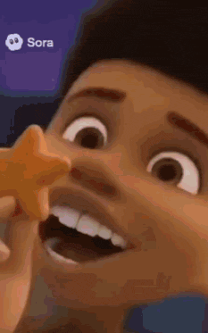 a close up of a cartoon character holding a starfish in his mouth .