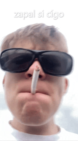 a man wearing sunglasses is smoking a cigarette with the words zapal si cigo above him
