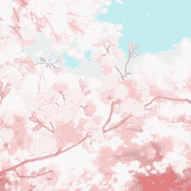 a tree with pink flowers against a blue sky with clouds