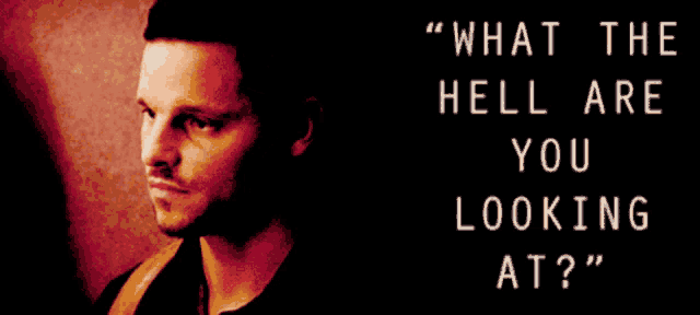 a poster with a man and the words " what the hell are you looking at " on it