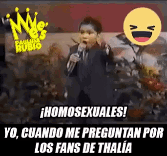 a young boy singing into a microphone with a smiley face behind him that says " homosexuales "