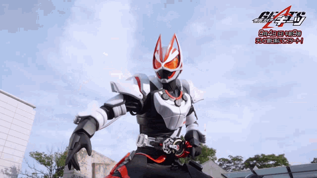 a man in a masked rider costume is riding a motorcycle