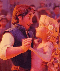 a man and a woman are dancing in front of a crowd of people
