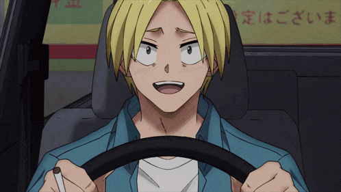 a man in a blue shirt is sitting in the driver 's seat of a vehicle