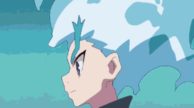a close up of a person 's head with blue hair