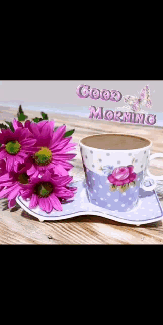 a cup of coffee on a saucer next to a bouquet of pink flowers and the words good morning .
