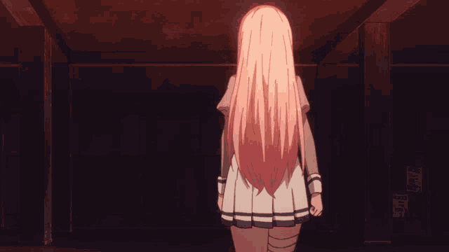 a girl with long pink hair is walking in a dark room