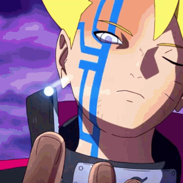 a close up of a person 's face with a blue stripe on it