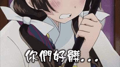 a girl holding a stick with chinese writing on the bottom