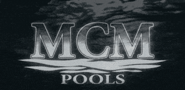 a logo for mcm pools is displayed on a dark background