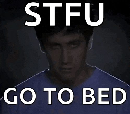 a man in a blue shirt with the words stfu go to bed above him
