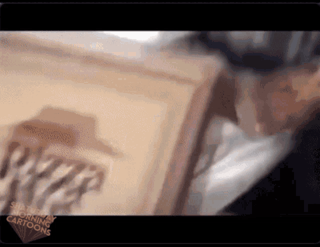 a pizza hut box is being opened in a cartoon
