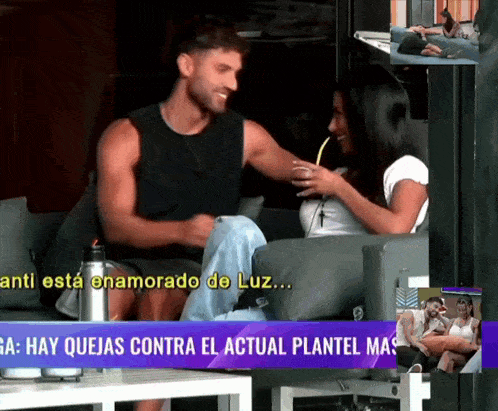 a man and a woman are sitting on a couch and a purple banner says hay quejas contra el actual plantel mas
