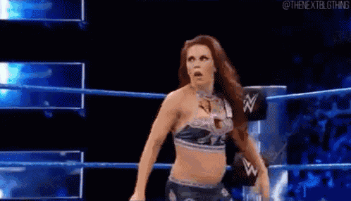 two women are wrestling in a wrestling ring on a wrestling show .