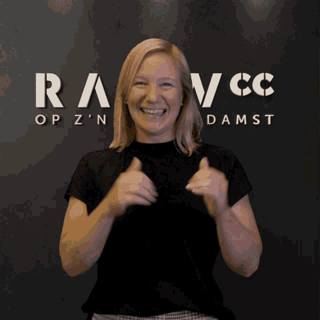 a woman stands in front of a sign that says ray op z n damst