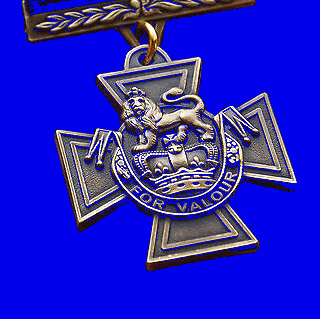a gold cross with a lion and the words for valour on it
